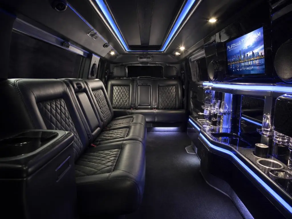 Upscale SUV limousine interior with quilted leather and mood lighting